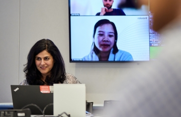 Woman on teleconference call.